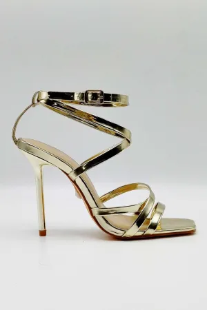 Reeba Strappy High Heel Sandals in Gold